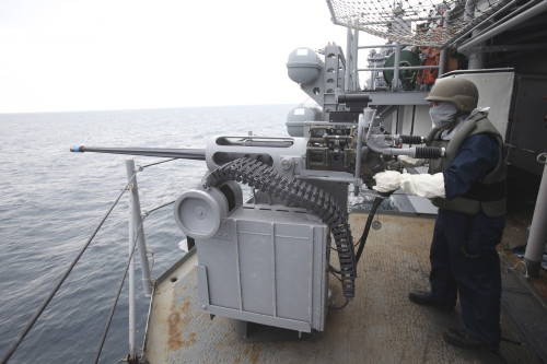 Atlantic Ocean, February 6, 2012 - Gunner's Mate mans a Mk 38 25mm machine gun aboard the amphibious assault ship USS Kearsarge during exercise Bold Alligator 2012. Poster Print - Item # VARPSTSTK105267M