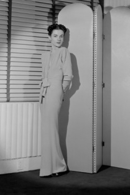 Portrait of young woman standing behind screen partition Poster Print - Item # VARSAL255419705