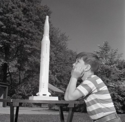 Boy playing with toy rocket Poster Print - Item # VARSAL255420967