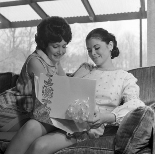 Young woman and her mother watching gift Poster Print - Item # VARSAL255420987