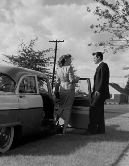 Man opening door and woman boarding into car Poster Print - Item # VARSAL255422137