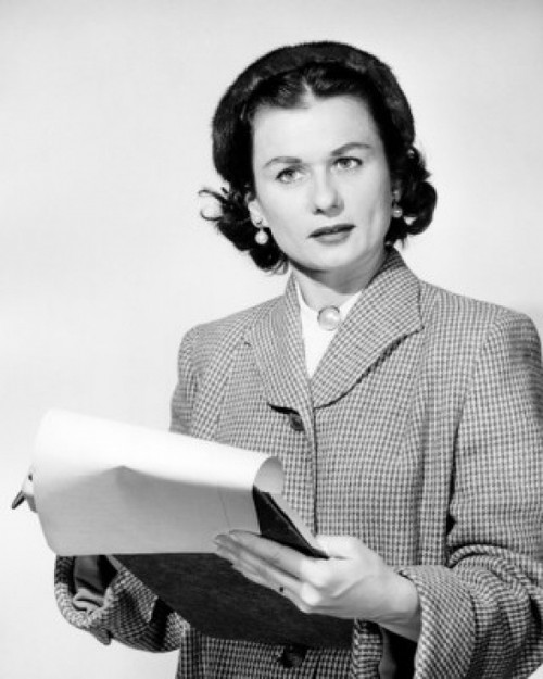 Close-up of a businesswoman holding a pen and a clipboard Poster Print - Item # VARSAL25528018