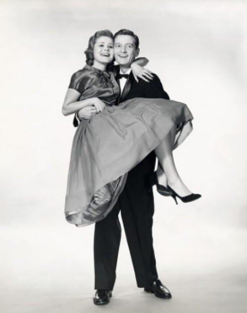 Young man carrying a young woman Poster Print - Item # VARSAL2558980