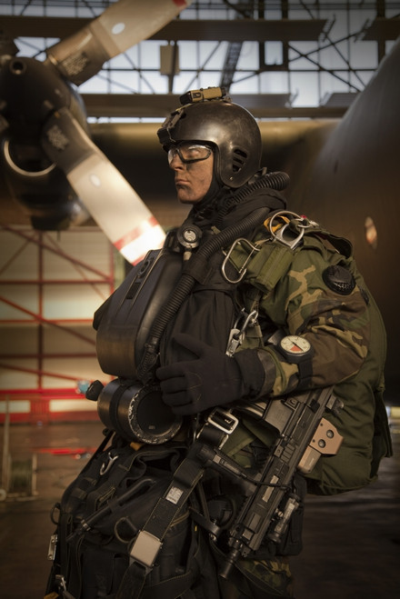 U.S. Navy Seal combat diver equipped with night vision, prepares