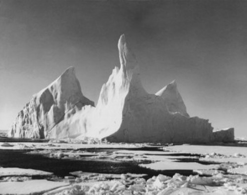Iceberg floating on water Poster Print