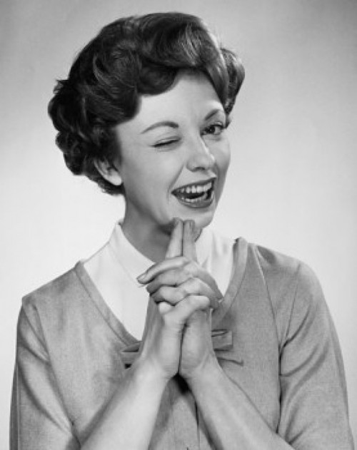 Studio portrait of young woman winking Poster Print - Item # VARSAL25511230B Studio portrait of young woman winking Poster Print - Item # VARSAL25511230B