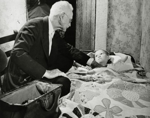 Side profile of a male doctor examining a girl Poster Print - Item # VARSAL25524107