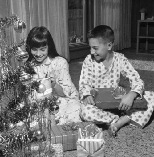 Happy children with Christmas gifts near Christmas tree Poster Print - Item # VARSAL255417398