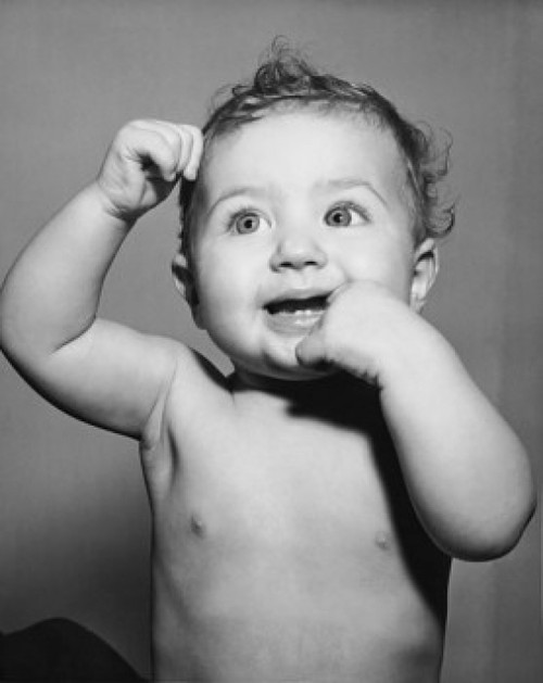 Close-up of a baby with it's finger in it's mouth Poster Print - Item # VARSAL2559514E
