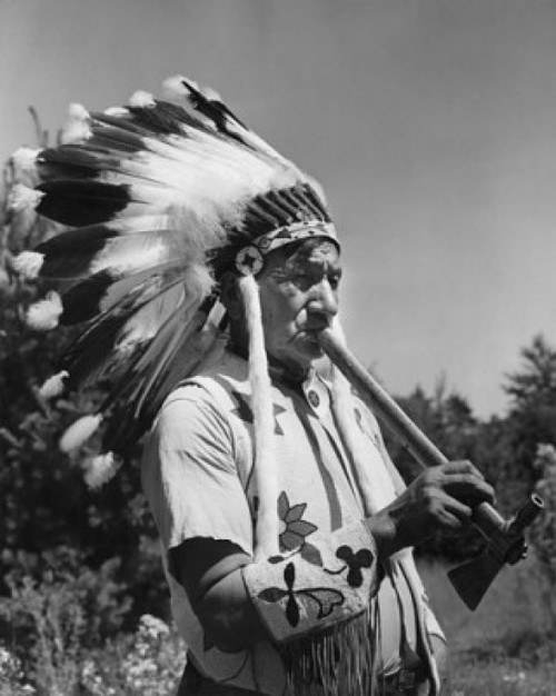 Tribal man playing a flute Poster Print - Item # VARSAL25591490