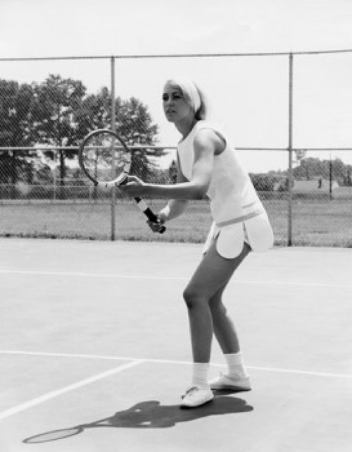 Young woman playing tennis on a tennis court Poster Print - Item # VARSAL25524211