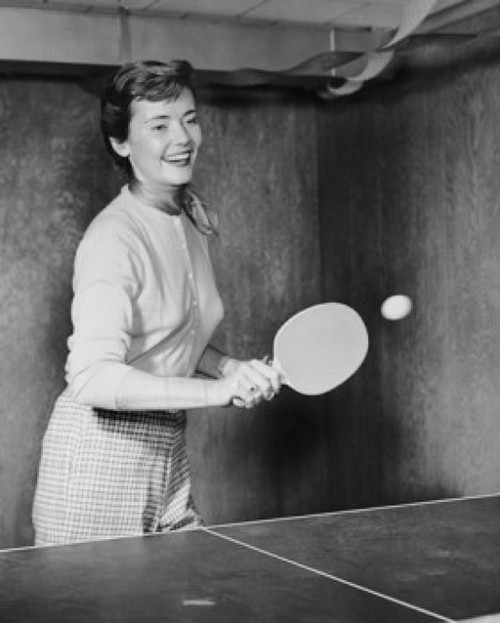 Young woman playing table tennis Poster Print - Item # VARSAL25524640B
