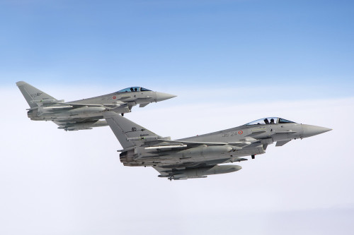 A pair of Italian Air Force F-2000A Typhoon aircraft flying over the Tyrrhenian Sea during an air-to-air refueling operation. Poster Print - Item # VARPSTDFC100125M