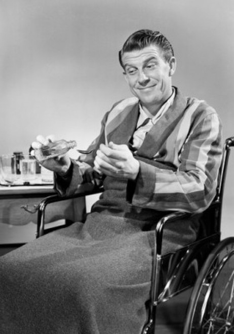 Man in wheelchair taking medicine Poster Print - Item # VARSAL255417505