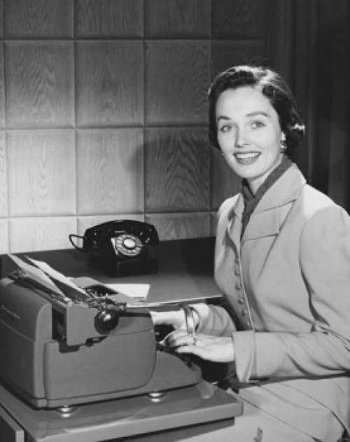 Businesswoman typing on a typewriter in an office Poster Print - Item # VARSAL2554181