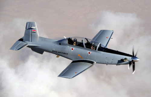 An Iraqi Air Force T-6 Texan trainer aircraft over Tikrit, Iraq Poster Print - Item # VARPSTSTK104841M