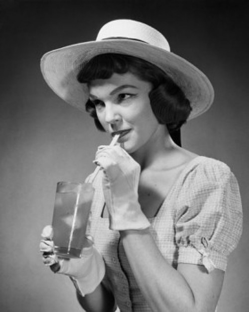 Close-up of a young woman drinking lemonade Poster Print - Item # VARSAL25512642A