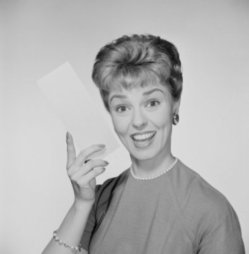 Studio portrait of woman holding envelope Poster Print - Item # VARSAL255422444B