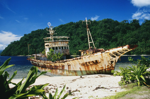 Shipwrecked fishing boat on beach; Papua New Guinea PosterPrint - Item # VARDPI1987691