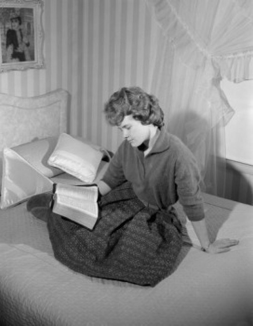 Girl reading book in bed Poster Print - Item # VARSAL255423004