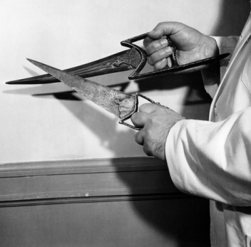 Mid section view of a man holding Indian Thrusting Daggers Poster Print - Item # VARSAL9904505