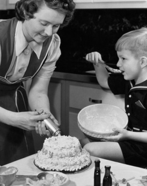 Mid adult woman preparing a cake with her son sitting beside her Poster Print - Item # VARSAL25536209 Mid adult woman preparing a cake with her son sitting beside her Poster Print - Item # VARSAL25536209