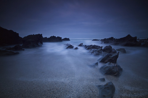 Long exposure of rocks on the beach at night;Newquay cornwall england PosterPrint - Item # VARDPI2317491