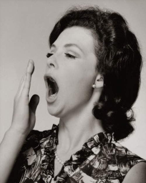 Close-up of a young woman yawning Poster Print - Item # VARSAL25510447