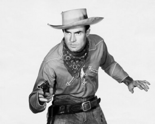 Close-up of a cowboy holding a pistol Poster Print - Item # VARSAL25512792