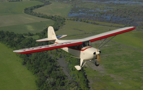 Aeronca Chief flying over Sacramento Valley, California. Poster Print - Item # VARPSTPWA100017M