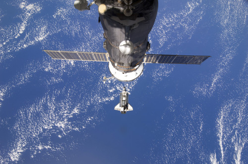 Space Shuttle Discovery approaches the International Space Station Poster Print - Item # VARPSTSTK203639S