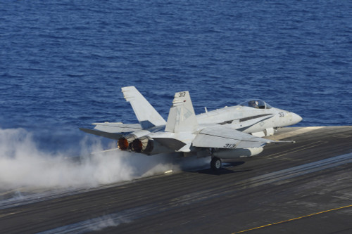 Mediterranean Sea, October 23, 2013 - An F/A-18C Hornet launches from the flight deck of the aircraft carrier USS Nimitz. Poster Print - Item # VARPSTSTK108065M