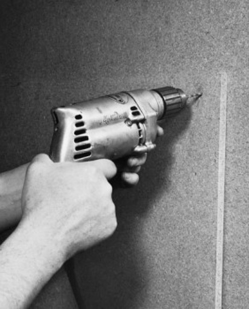 Close-up of a person's hands drilling into a wall Poster Print - Item # VARSAL25537102