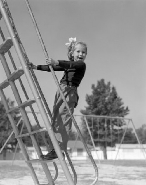 Girl on monkey bars in playground Poster Print - Item # VARSAL25514175