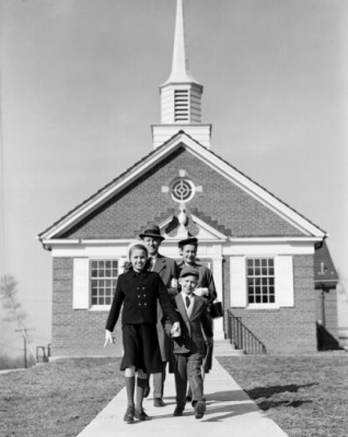 Parents with children in front of church Poster Print - Item # VARSAL255421887