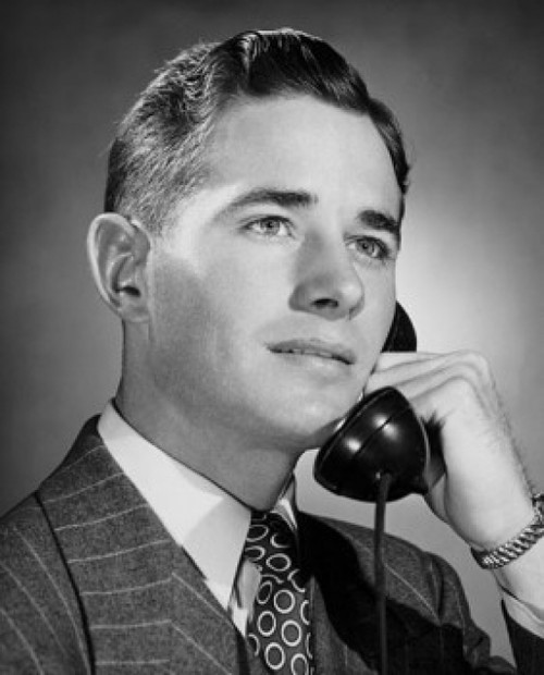 Young businessman using telephone Poster Print - Item # VARSAL25548263