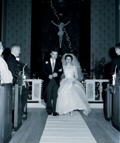 Portrait of newly wed couple in church Poster Print - Item # VARSAL255417201
