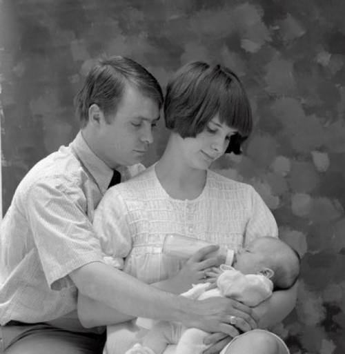 Mother  father and baby Poster Print