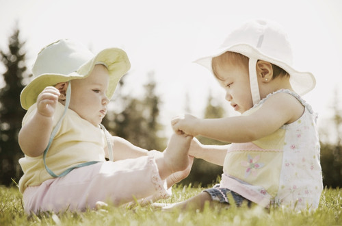 Two Girls Sit Together PosterPrint