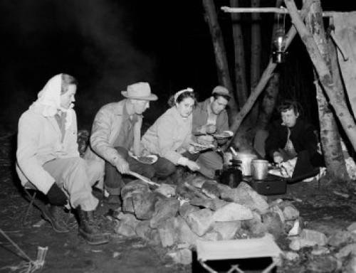 group of people sitting in fire camp Poster Print - Item # VARSAL255423287