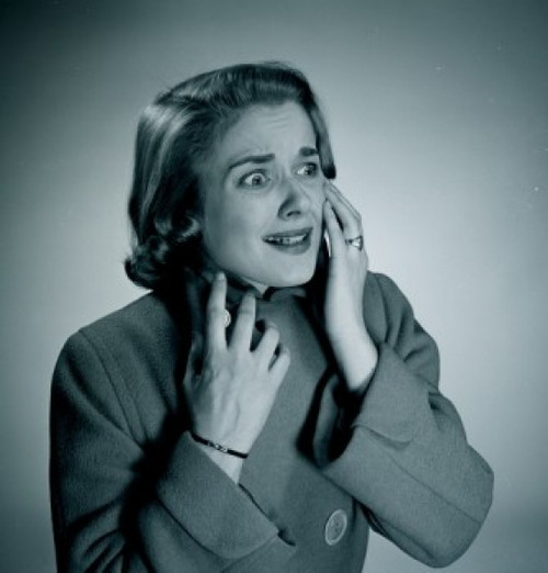 Studio shot of terrified young woman Poster Print - Item # VARSAL255417175