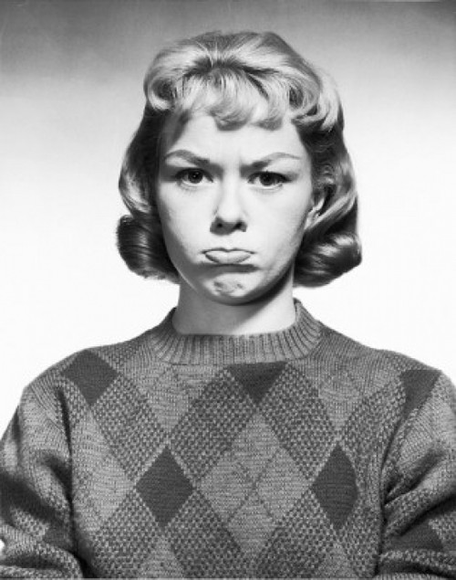 Portrait of a young woman making a face Poster Print - Item # VARSAL25511056