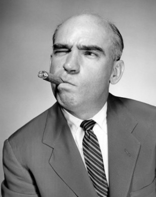 Studio portrait of man smoking cigar Poster Print - Item # VARSAL25549374