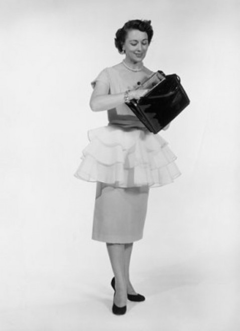 Young woman holding hand bag Poster Print - Item # VARSAL25542045