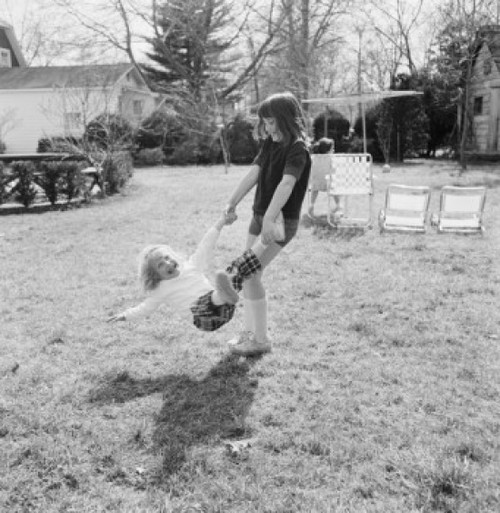 Two sisters playing in backyard Poster Print - Item # VARSAL255422350
