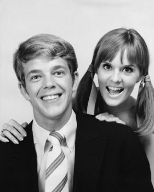 Portrait of a young man and a teenage girl smiling Poster Print - Item # VARSAL2557325