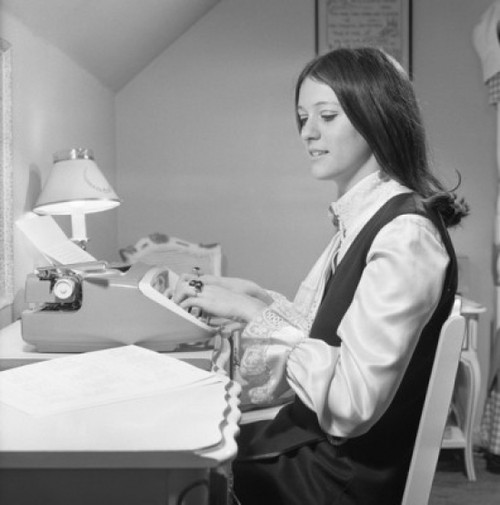 Young woman working in office Poster Print - Item # VARSAL255420991