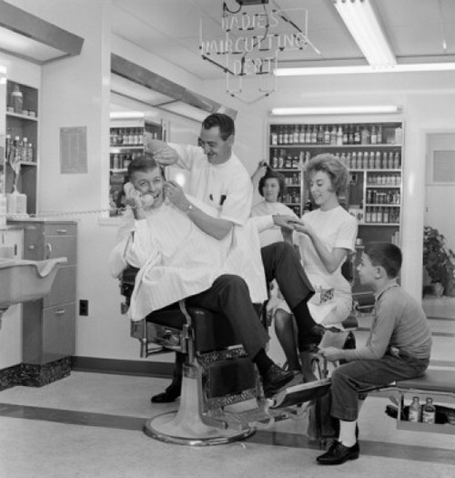 Mid adult man receiving treatment in a hair salon Poster Print - Item # VARSAL2558901B