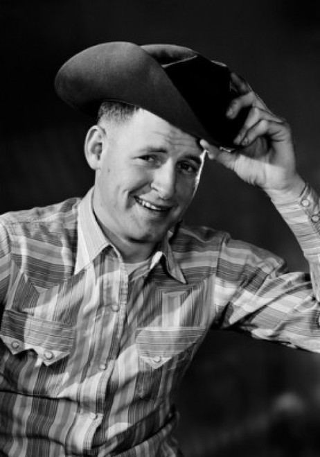 Portrait of smiling man wearing cowboy hat Poster Print - Item # VARSAL255419959