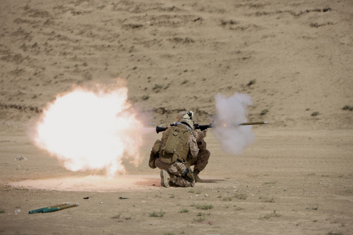 U.S. Marine fires a HE fragmentation round from the RPG-7 rocket-propelled grenade launcher in a wadi near Kunduz, Afghanistan Poster Print - Item # VARPSTTMO100350M